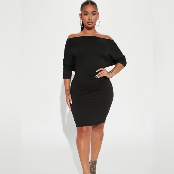 Black off the shoulder  
• Mini Dress
• 3/4 Sleeve
• Off Shoulder
• Stretch - Picture 1 of 3